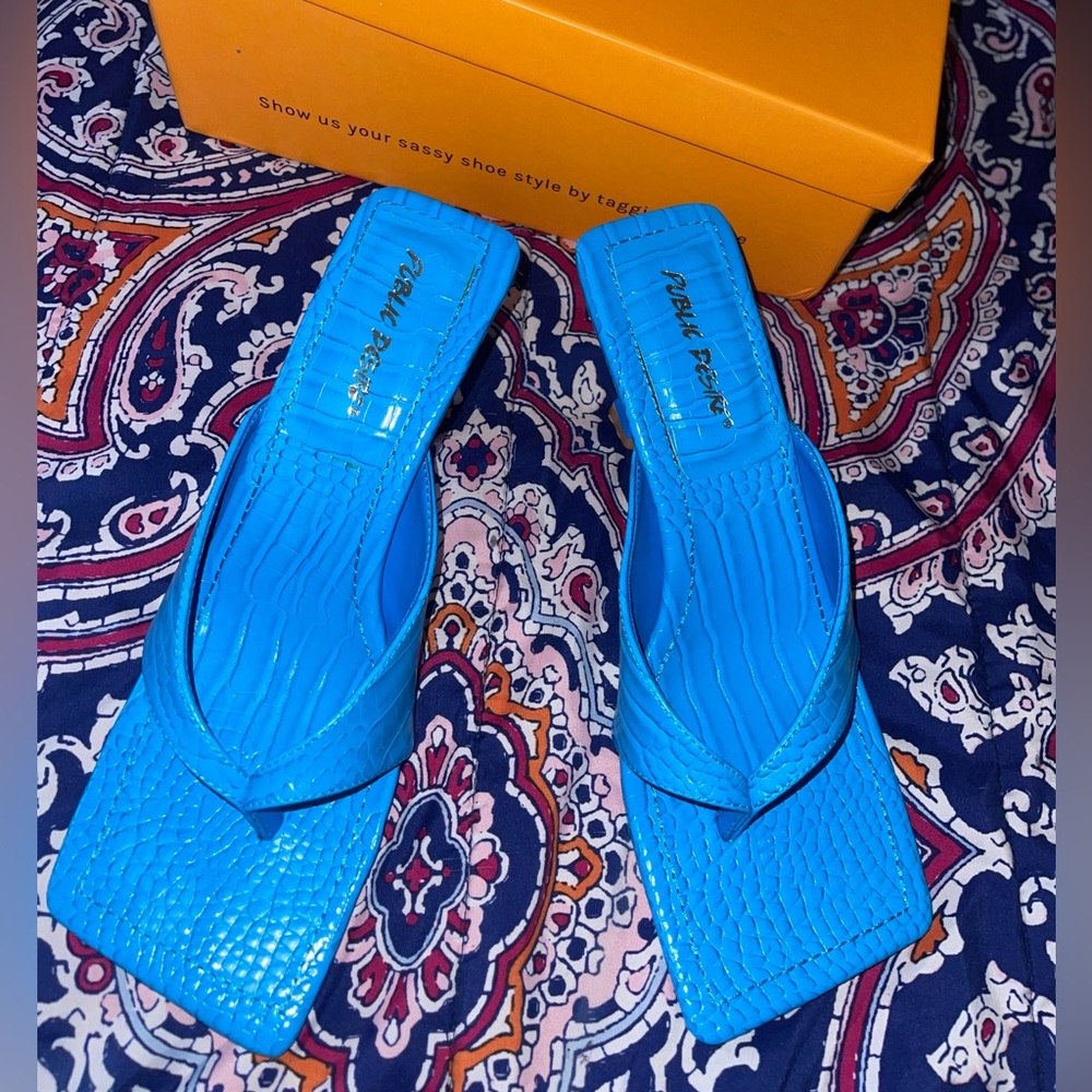Blue croc heels